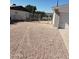 Gravel side yard with chain link fence at 908 S Ocotillo Dr, Apache Junction, AZ 85120
