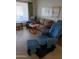 Bright living room featuring comfortable seating and large windows at 908 S Ocotillo Dr, Apache Junction, AZ 85120