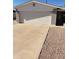 Attached garage with driveway at 908 S Ocotillo Dr, Apache Junction, AZ 85120