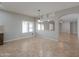 Bright dining area with views into the Gathering room and kitchen at 1794 E Wildflower Ln, Casa Grande, AZ 85122