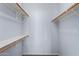 Walk-in closet with double rods and a shelf for storage at 1951 N 64Th St # 10, Mesa, AZ 85205