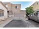 Two-story house with attached garage and driveway at 22223 N 29Th Dr, Phoenix, AZ 85027