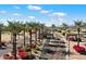 Gated entrance to a community with palm trees at 16419 W Chuparosa Ln, Surprise, AZ 85387