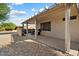 Covered patio with seating area and grill at 16419 W Chuparosa Ln, Surprise, AZ 85387