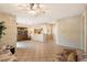 Open concept living room with kitchen and dining area views at 16419 W Chuparosa Ln, Surprise, AZ 85387