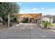 Single story home with carport and artificial turf at 4121 W Medlock Dr, Phoenix, AZ 85019