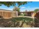 Backyard view showcasing a wooden fence and a patio area at 4121 W Medlock Dr, Phoenix, AZ 85019