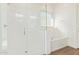 Spa-like bathroom with a glass shower enclosure and a soaking tub at 21033 E Camina Buena Vis, Queen Creek, AZ 85142