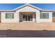 New construction home with covered patio and spacious backyard at 21033 E Camina Buena Vis, Queen Creek, AZ 85142
