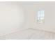 Spacious bedroom with carpeted floor and window with blinds at 21033 E Camina Buena Vis, Queen Creek, AZ 85142