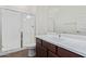 Clean bathroom with single vanity, shower, and toilet at 21033 E Camina Buena Vis, Queen Creek, AZ 85142