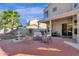 Spacious backyard with patio, seating area, and water feature at 5542 E Anderson Dr, Scottsdale, AZ 85254
