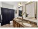 Bathroom with double sinks and updated vanity at 5542 E Anderson Dr, Scottsdale, AZ 85254