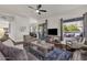 Spacious living area featuring a cozy seating arrangement and large windows at 5542 E Anderson Dr, Scottsdale, AZ 85254