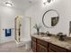 Bathroom with granite vanity, shower, and updated fixtures at 5542 E Anderson Dr, Scottsdale, AZ 85254