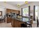 Kitchen island with granite countertops and stainless steel appliances at 5542 E Anderson Dr, Scottsdale, AZ 85254