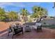 Relaxing backyard patio with seating area and lush landscaping at 5542 E Anderson Dr, Scottsdale, AZ 85254