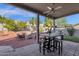 Relaxing patio with seating area, grill, and shade at 5542 E Anderson Dr, Scottsdale, AZ 85254