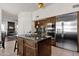 Kitchen with stainless steel appliances and island at 5542 E Anderson Dr, Scottsdale, AZ 85254