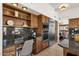 Kitchen with granite countertops and built-in desk at 5542 E Anderson Dr, Scottsdale, AZ 85254