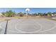 Full-size paved basketball court in sunny community park at 25600 W St James Ave, Buckeye, AZ 85326