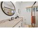 Bathroom with a large vanity and walk-in shower at 8575 E Sharon Dr, Scottsdale, AZ 85260