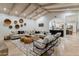 Open concept living room with high ceilings, neutral tones, and natural light at 8575 E Sharon Dr, Scottsdale, AZ 85260