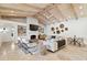Open living area with vaulted ceilings,tile flooring, and ample natural light at 8575 E Sharon Dr, Scottsdale, AZ 85260