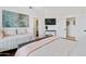Bright bedroom with king-size bed, daybed, and access to closet at 8575 E Sharon Dr, Scottsdale, AZ 85260
