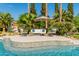 Relaxing poolside patio furniture with a view of the pool at 8575 E Sharon Dr, Scottsdale, AZ 85260
