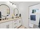 Modern bathroom with double vanity, and an additional toilet area at 8575 E Sharon Dr, Scottsdale, AZ 85260