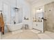 Spa-like bathroom with soaking tub and walk-in shower at 8575 E Sharon Dr, Scottsdale, AZ 85260