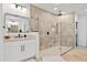 Contemporary bathroom with walk-in shower and floating vanity at 8575 E Sharon Dr, Scottsdale, AZ 85260