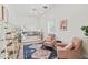 Bedroom with a bunk bed, two armchairs, and area rug at 8575 E Sharon Dr, Scottsdale, AZ 85260