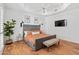 Spacious main bedroom with king bed, and wood flooring at 8575 E Sharon Dr, Scottsdale, AZ 85260