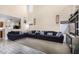 Spacious living room featuring a high ceiling, neutral walls, and ample natural light at 13165 W Ventura St, Surprise, AZ 85379