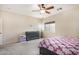 Second bedroom with a dresser and a double bed at 13165 W Ventura St, Surprise, AZ 85379