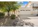 Single-story home with attached garage and landscaped front yard at 16015 E El Lago Blvd # 102B, Fountain Hills, AZ 85268