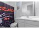 Clean bathroom with white vanity, shower, and toilet at 18767 W Canterbury Dr, Surprise, AZ 85388
