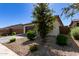 House exterior showcasing landscaping and driveway at 18767 W Canterbury Dr, Surprise, AZ 85388