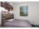 Bedroom with a full-size bed and car themed wall decor at 18767 W Canterbury Dr, Surprise, AZ 85388