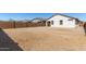 Large backyard with a block wall and plenty of space at 18767 W Canterbury Dr, Surprise, AZ 85388