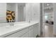 Double vanity bathroom with sunflower shower curtain at 18767 W Canterbury Dr, Surprise, AZ 85388