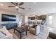 Open living room features a neutral color palette and flows into the kitchen at 247 E Las Puertas Ln, San Tan Valley, AZ 85140