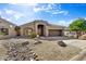 Single story home with desert landscaping and garage at 13789 E Geronimo Rd, Scottsdale, AZ 85259