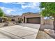 Single story home with desert landscaping and garage at 13789 E Geronimo Rd, Scottsdale, AZ 85259