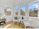 Light and bright sitting area with large windows and two comfortable white chairs at 13789 E Geronimo Rd, Scottsdale, AZ 85259