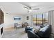 Living room with gray wood floors and comfy seating at 5136 N 31St Pl # 648, Phoenix, AZ 85016