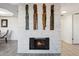 Modern fireplace with unique wall art at 5136 N 31St Pl # 648, Phoenix, AZ 85016