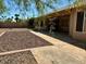 Large backyard with gravel and covered patio area at 8737 W Kimberly Way, Peoria, AZ 85382